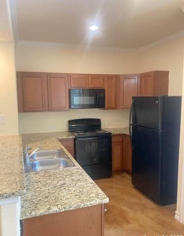 3-bedroom rental at 6335 Melanzane Unit 3 in San Antonio, TX — photo 3