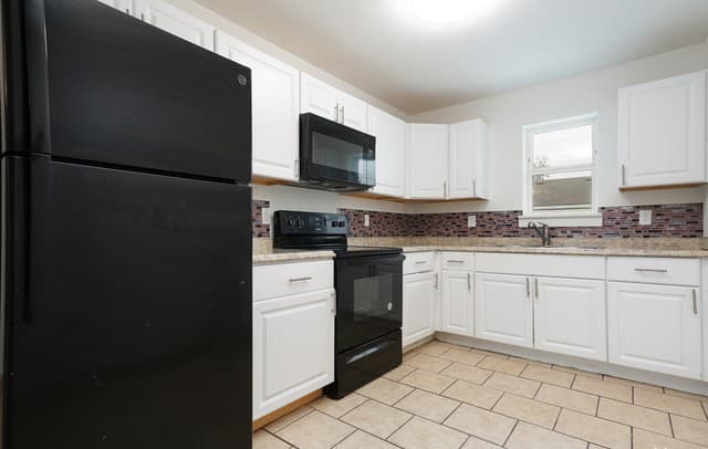 4-bedroom rental at 302 Cooper St Unit 201 in San Antonio TX